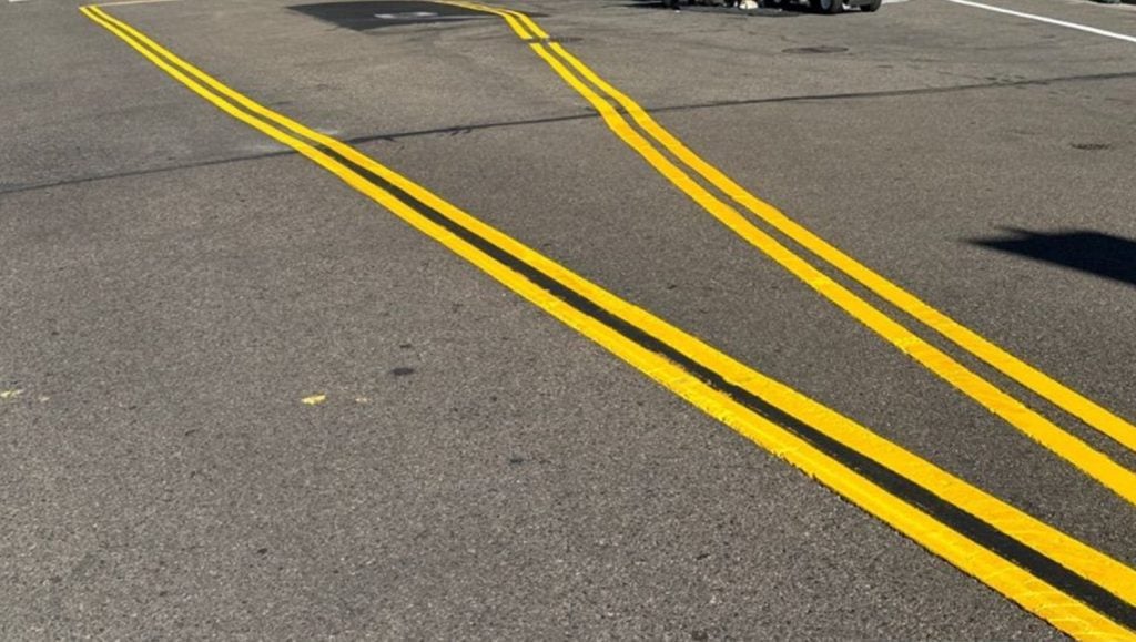freshly painted line markings for Folsom Field parking lot