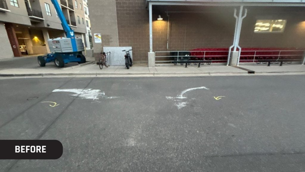 two faded arrows on Trader Joe's parking lot