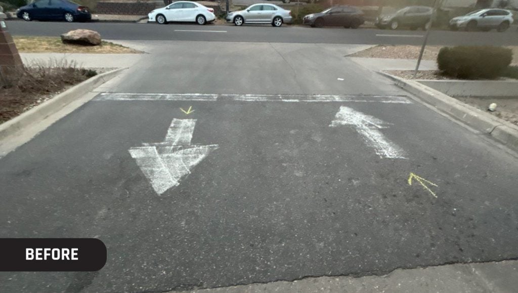 faded line markings on Trader Joe's parking lot close-up