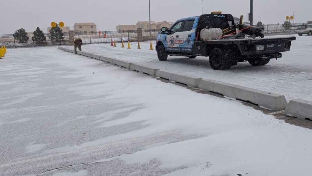 parking stops installed for Curbo Curbs parking lot