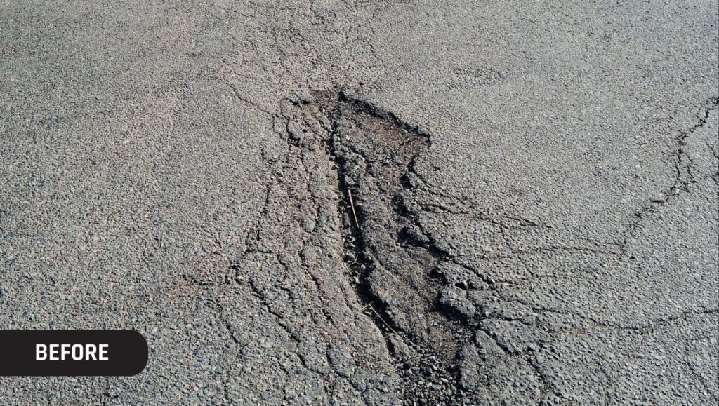 Net Leased Management parking lot with pothole