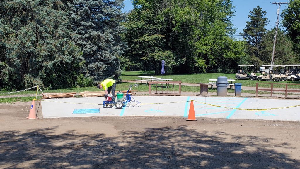 crew striping in ADA compliant stalls