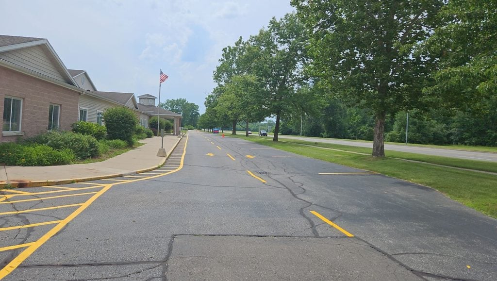 freshly painted yellow arrows and line markings for Taylor Exemplar Academy