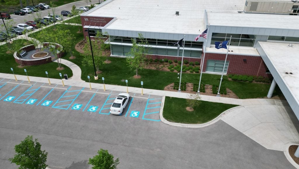 aerial view of veteran affairs clinic parking lot with freshly painted lines
