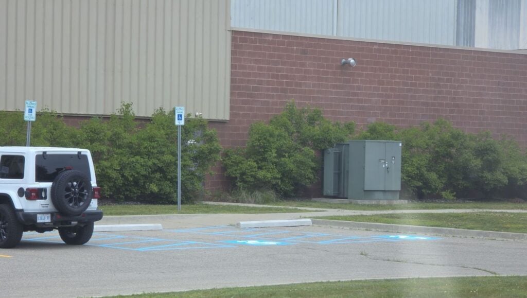 ada compliance parking spots freshly painted for Wyman Gordan parking lot