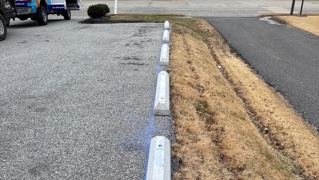 parking stops installed for office building close-up