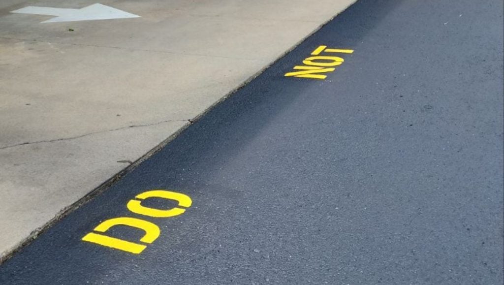 do not enter freshly painted on bank of america parking lot