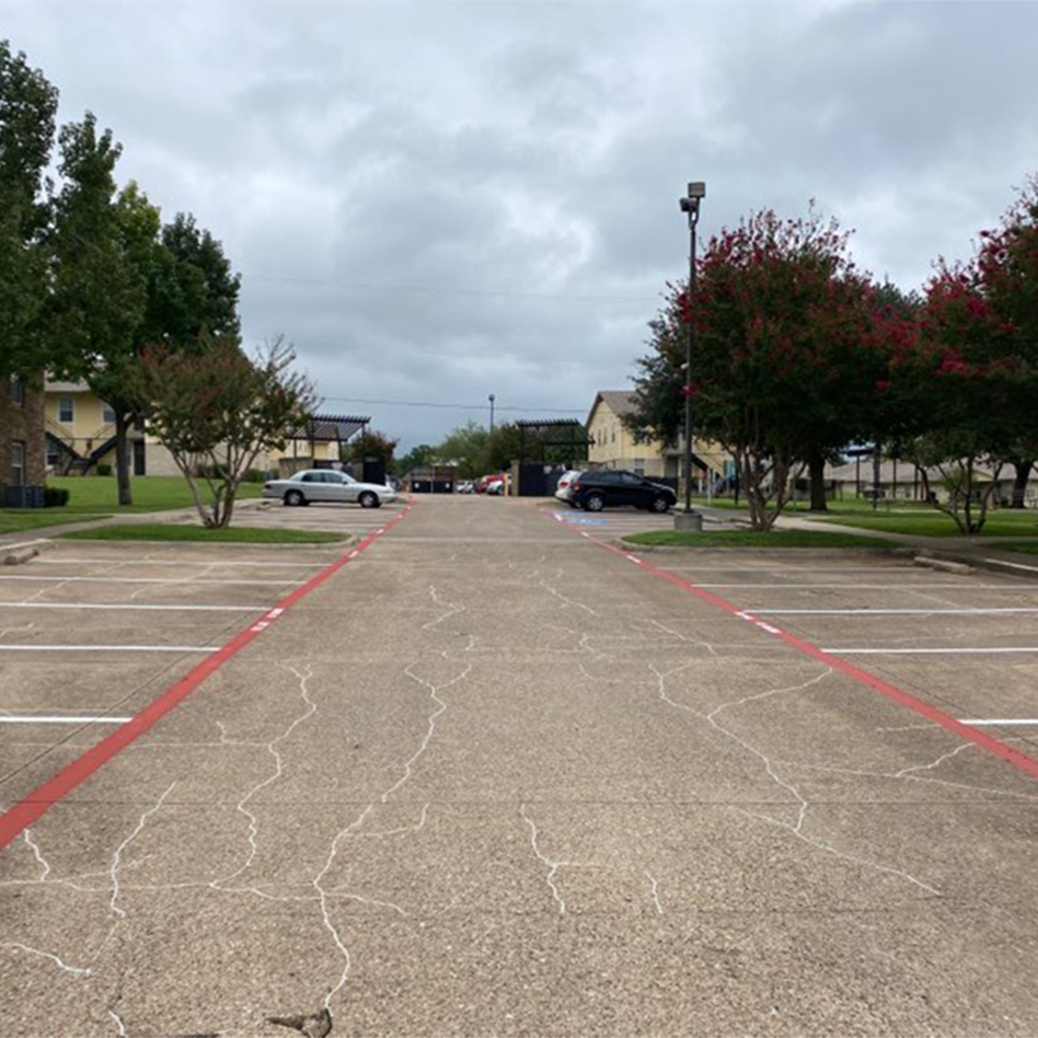 center view of freshly painted fire lanes at Red Oak Apartments