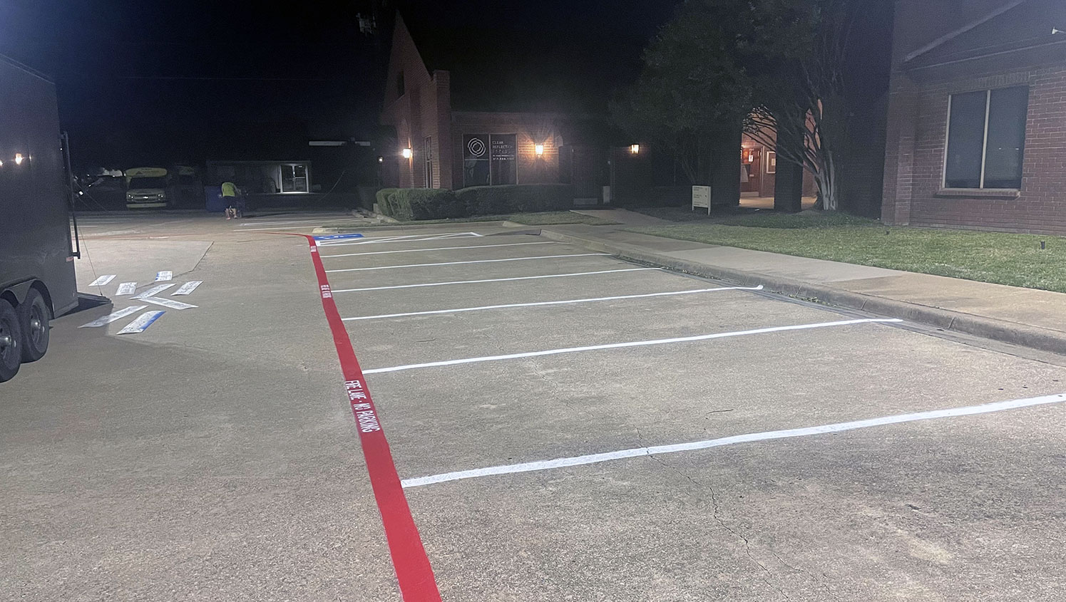 new fire lane markings and striped parking lot stalls at medical office