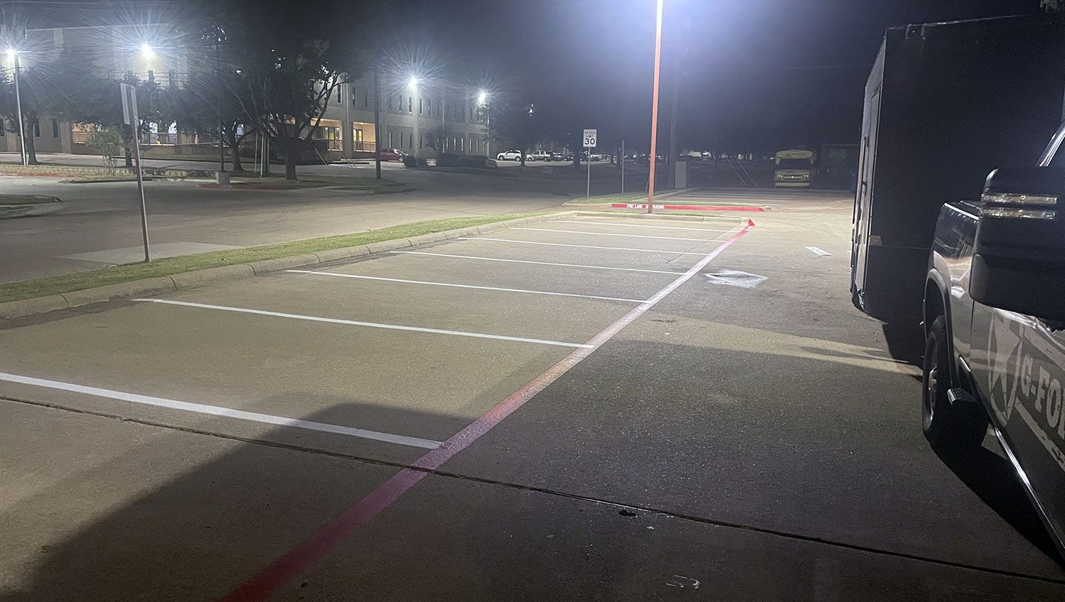 newly striped parking lot markings at medical office
