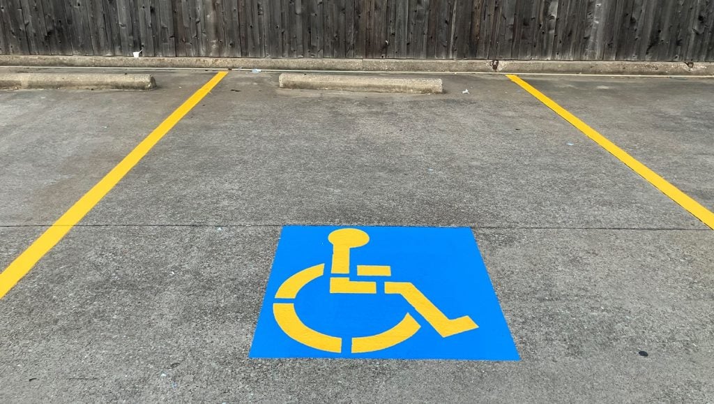 close-up of ada compliance parking spot freshly painted