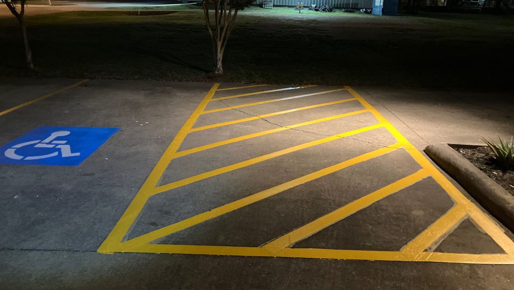 close-up of freshly painted crosswalk for 4 Separate Small Businesses