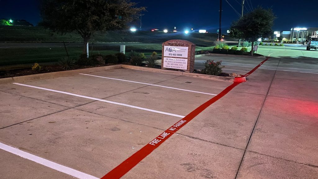 4 Separate Small Businesses parking lot with freshly painted fire lane striping