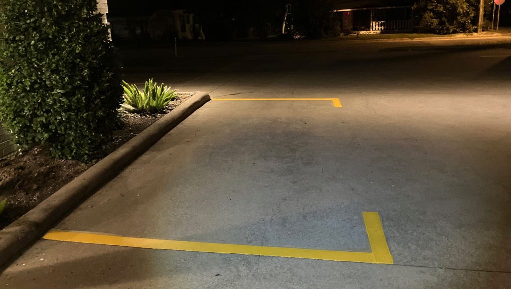 freshly painted yellow line markings for 4 Separate Small Businesses parking lot
