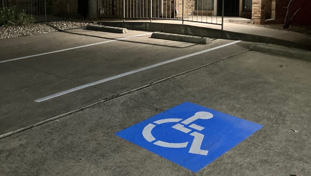 close-up of ada compliance parking spot freshly painted for DFW Neuropathy parking lot