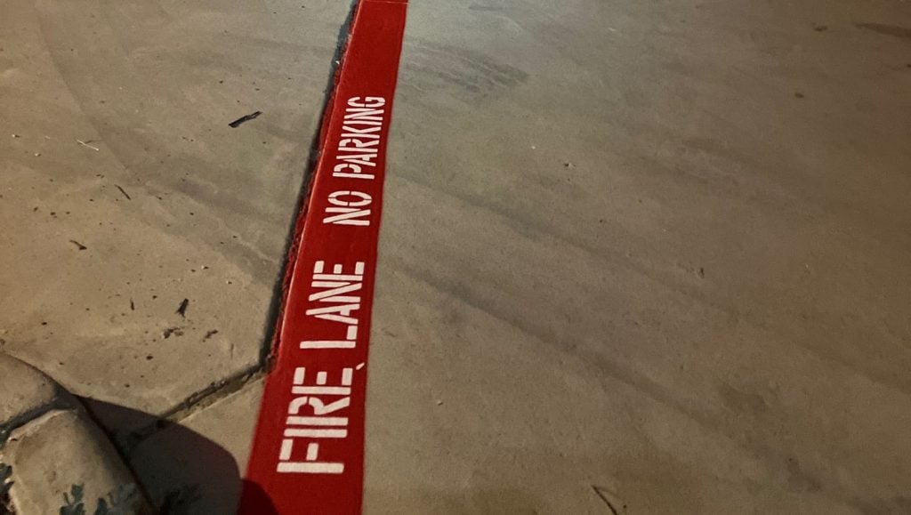 fire lane striping freshly painted for CVS parking lot