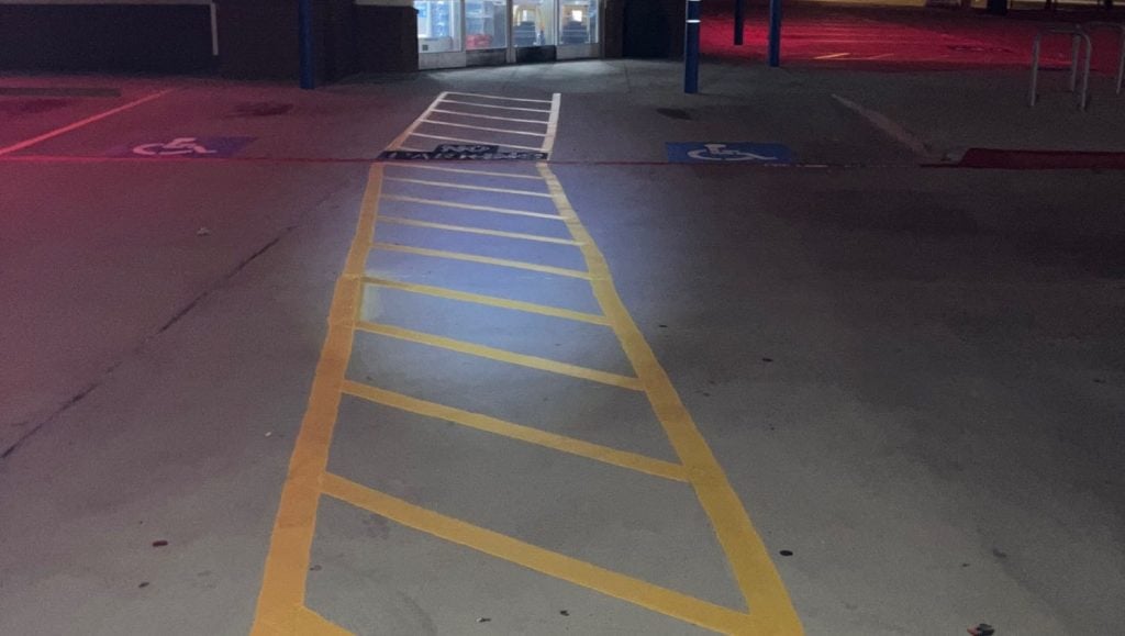 freshly painted crosswalk for CVS parking lot