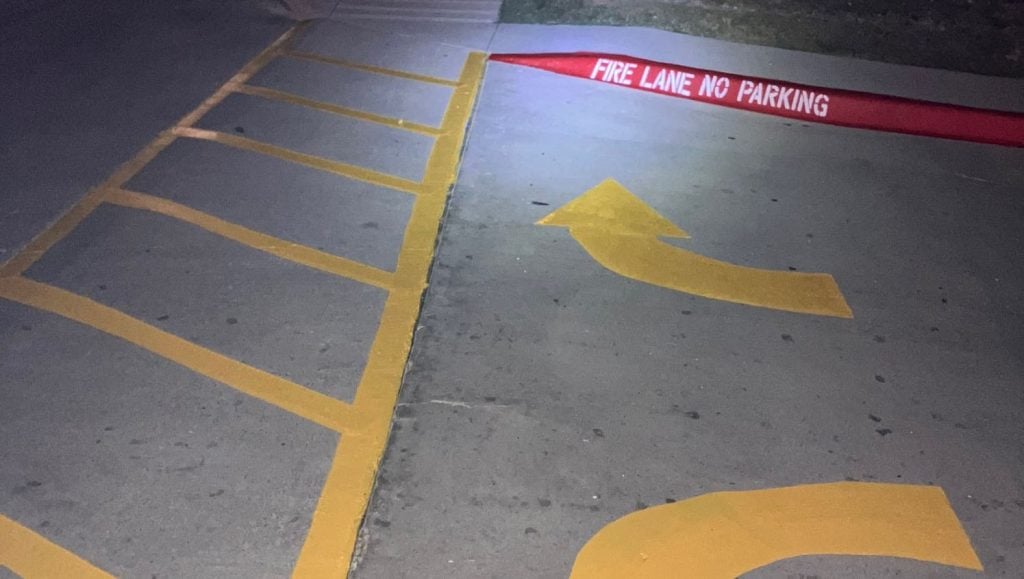 close-up of freshly painted line markings for CVS parking lot