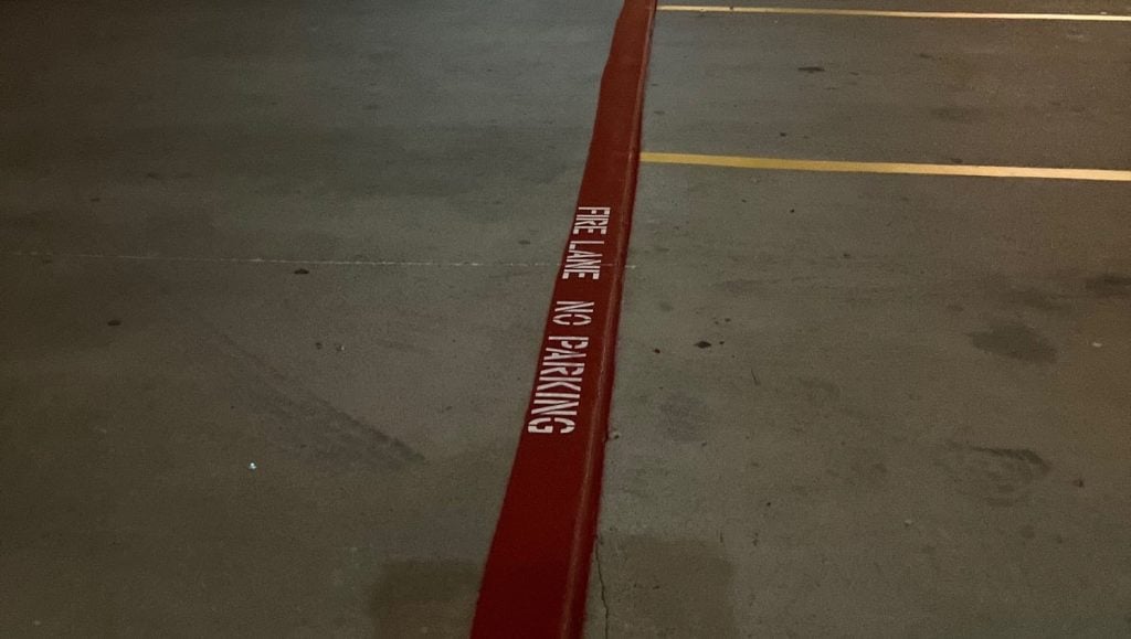 fire lane marking freshly painted for CVS parking lot