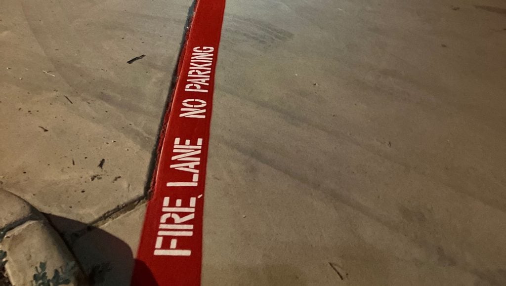 fire lane striping freshly painted close-up