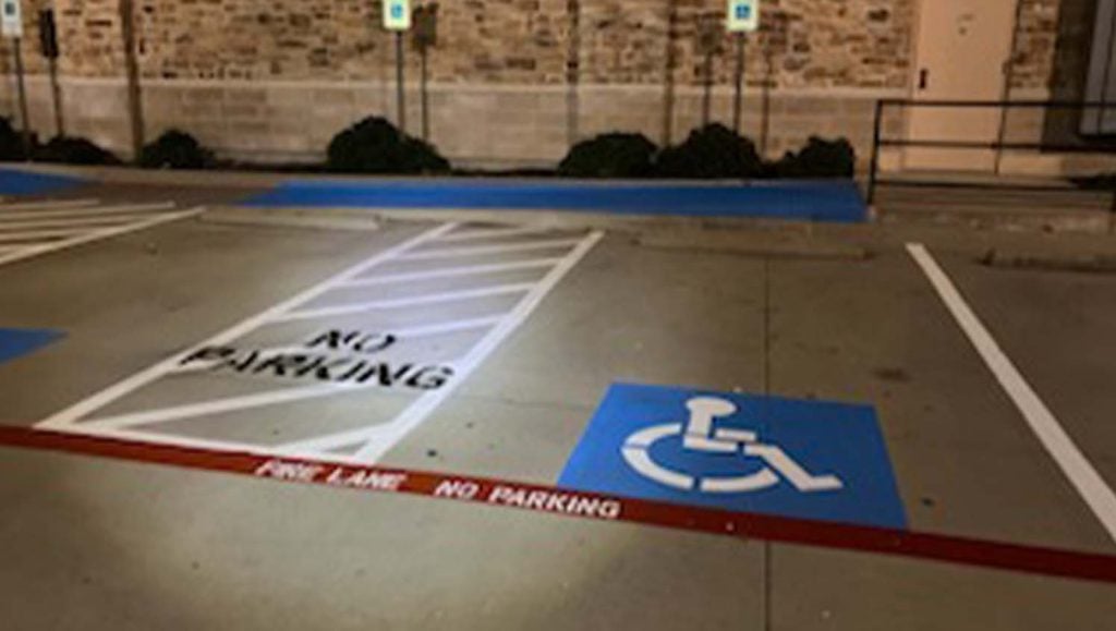 ada compliance parking spots freshly painted for Burleson Commons Shopping Center