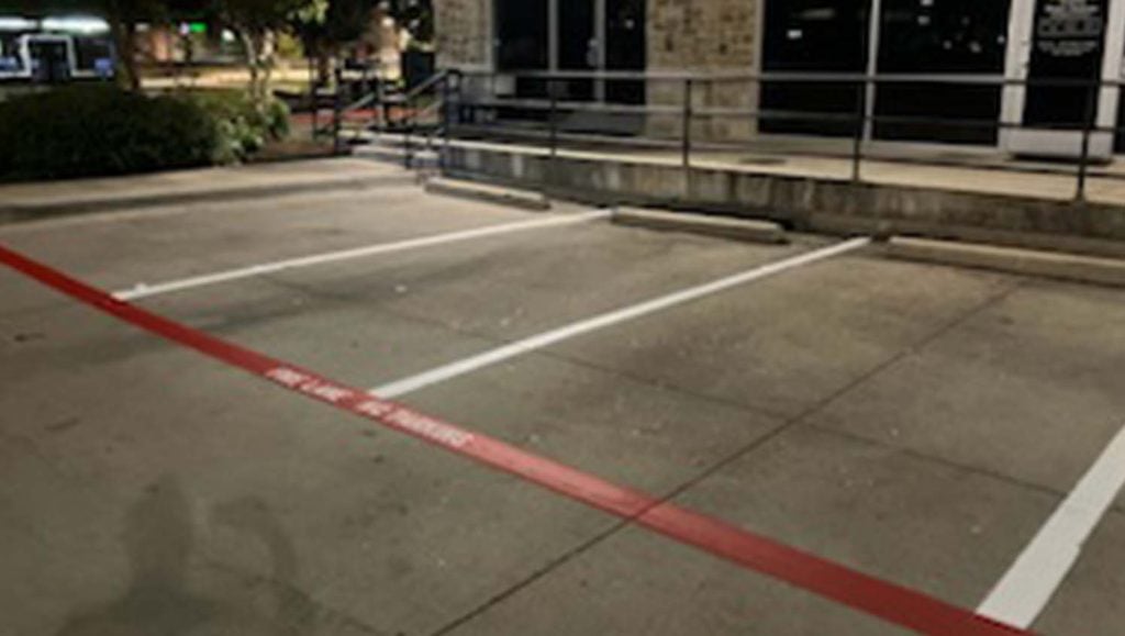 fire lane striping freshly painted for Burleson Commons Shopping Center parking lot