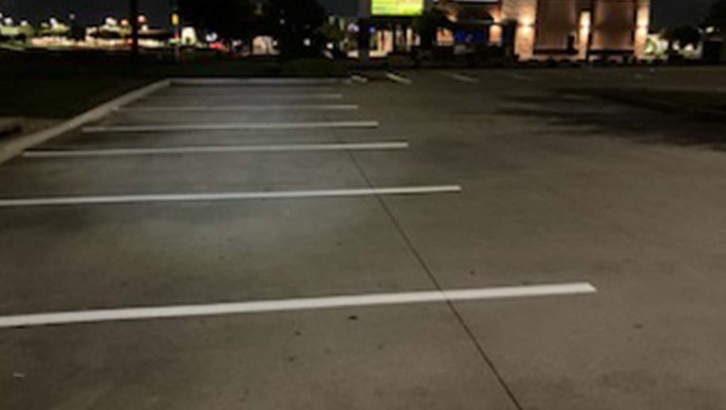 freshly painted line markings for Burleson Commons Shopping Center parking lot