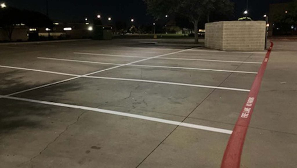 freshly painted line markings for Burleson Commons Shopping Center