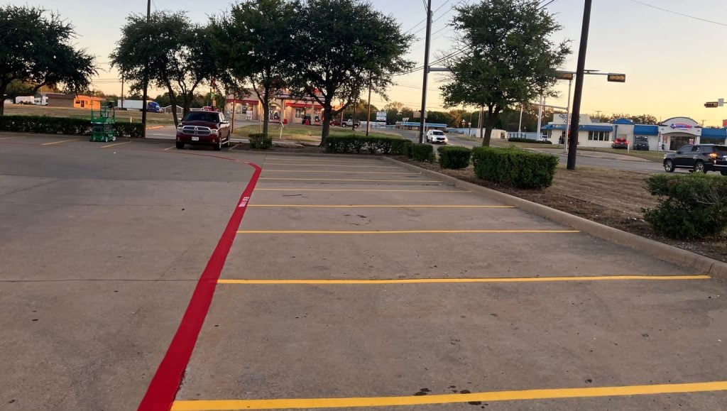 parking spots and fire lane markings freshly painted for CVS parking lot