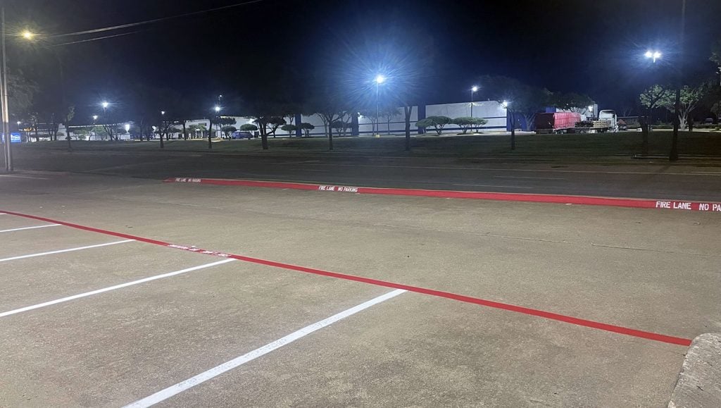new fire lane markings and striped parking lot stalls at medical office
