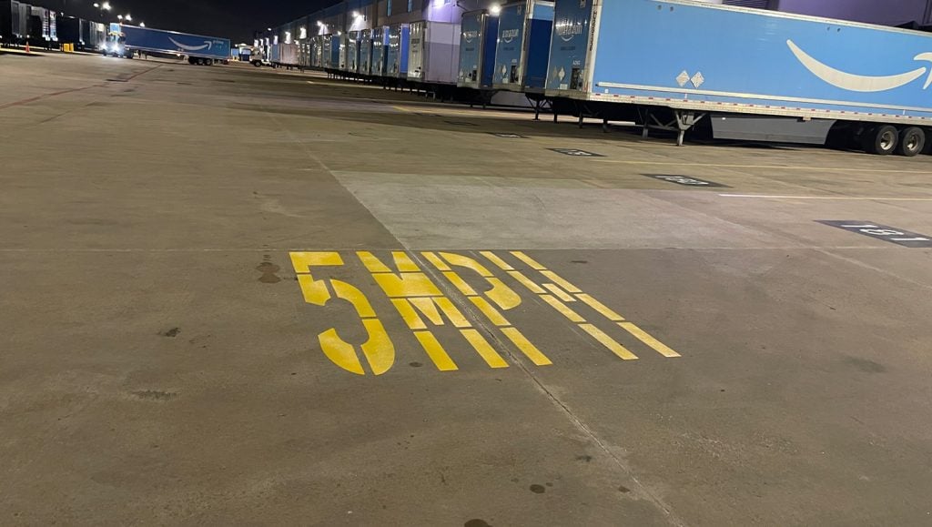 close-up of yellow line markings for Amazon