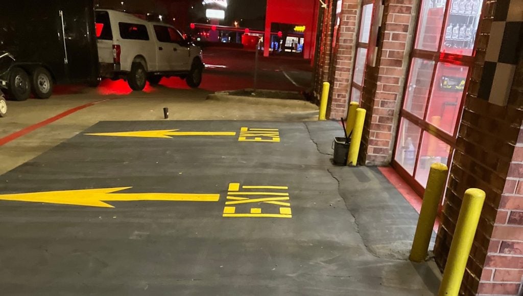 line markings freshly painted for Take 5 Oil Change parking lot