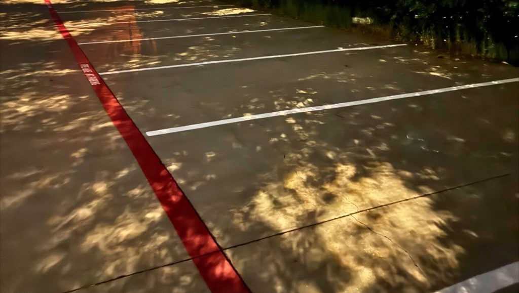 close-up of freshly painted line striping for Creature Comfort Animal Clinic parking lot