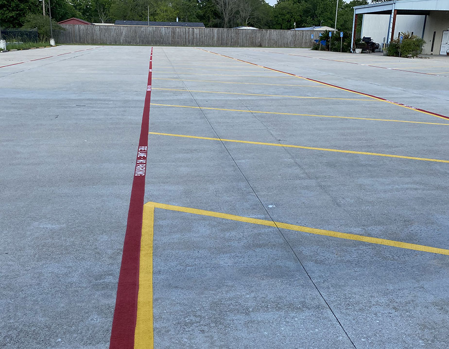 fire lane and parking stalls in concrete lot