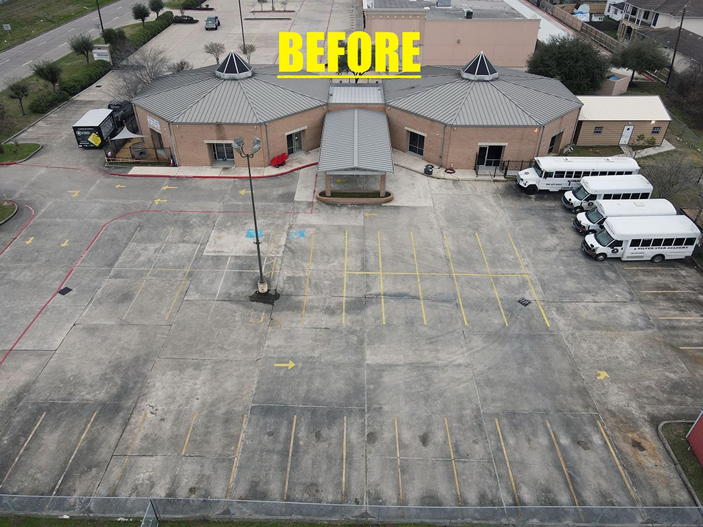 before shot of Silver Star Academy parking lot before being restriped