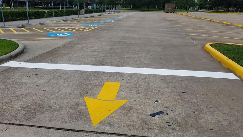 traffic markings on concrete lot