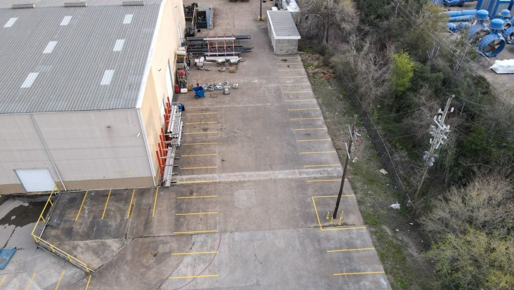 DSI parking lot freshly painted parking spots aerial view