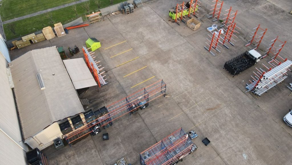 aerial view of DSI parking lot freshly painted