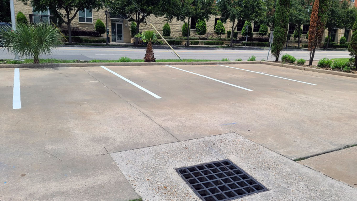 restriped parking lot lines and catch basin at the West Gray Center of Surgery in Houston, TX