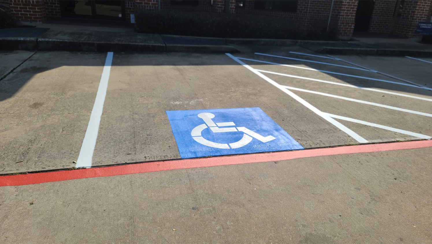 new ADA compliant parking lot stalls at Sugarland Pulmonary Clinic
