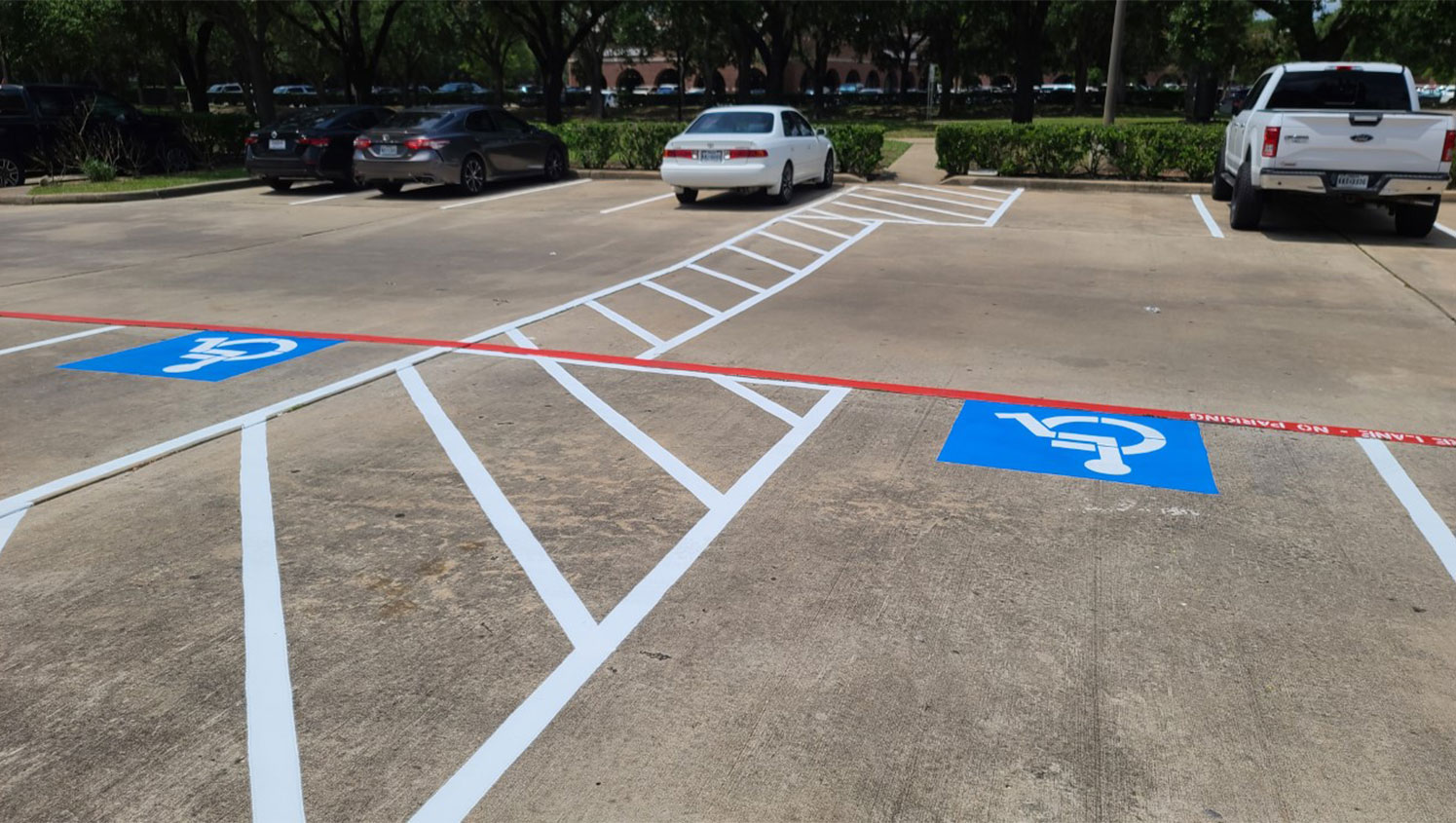 Re-striped ADA compliant parking lot stalls at Sugarland Pulmonary Clinic
