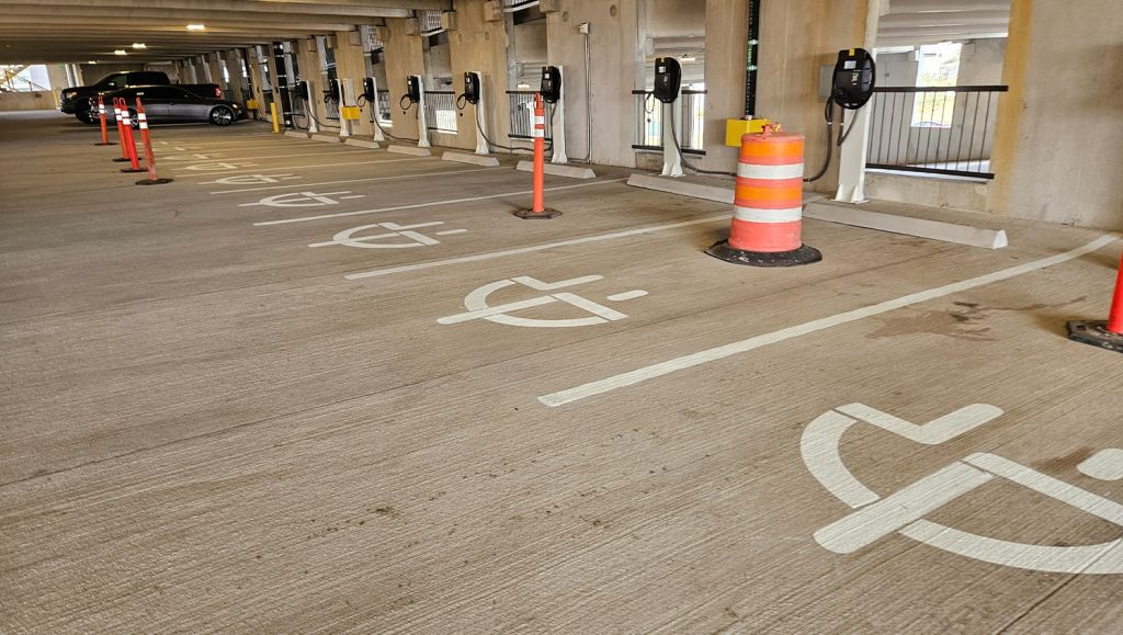 close-up of ev charging markings freshly painted for NextEdge parking lot