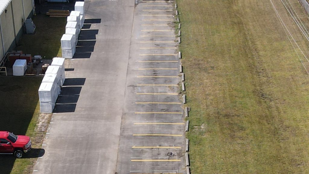 aerial view of Parkline, Inc. parking lot with freshly painted parking spots