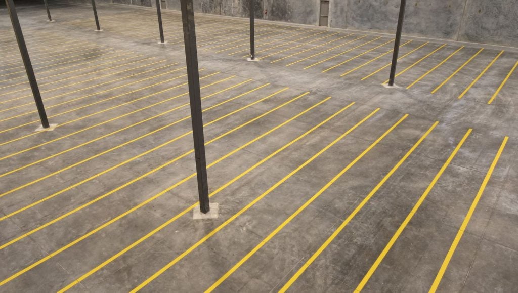 freshly painted yellow lines for NeuAg parking lot