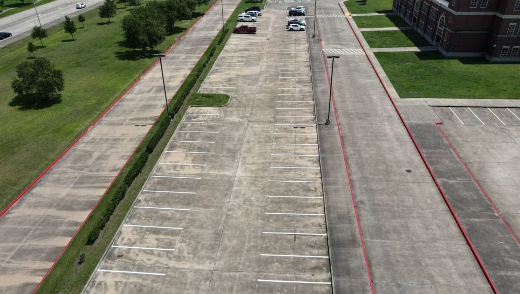Pearland ISD parking lot freshly painted aerial view