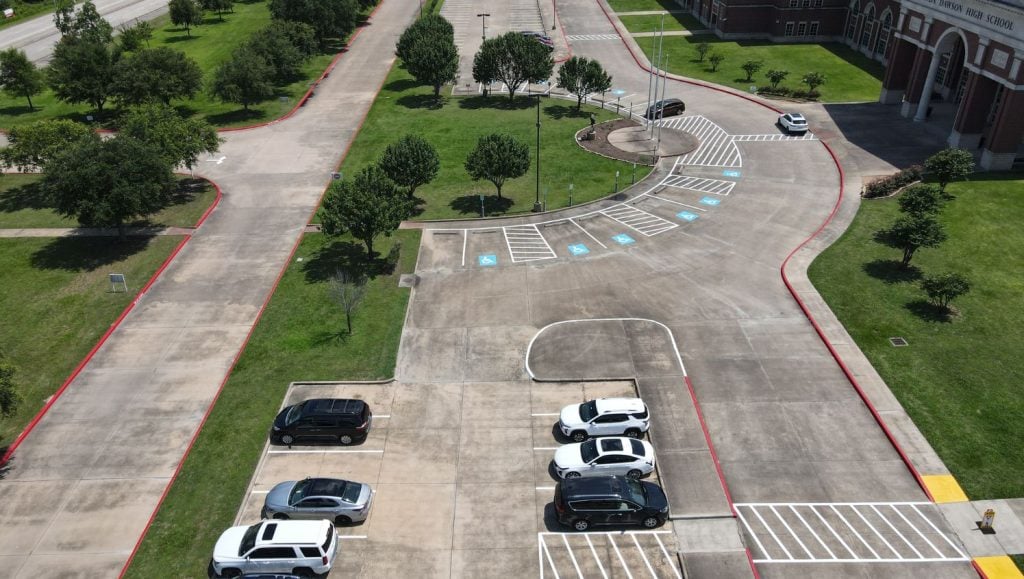 ada compliance parking spots freshly painted for Pearland ISD