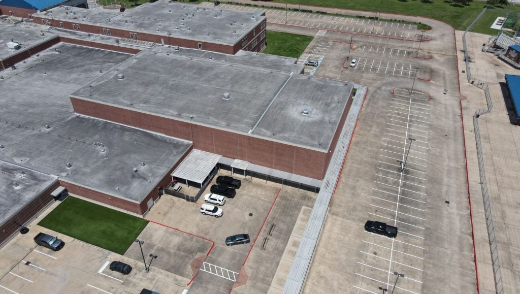 Pearland ISD parking lot freshly painted aerial view