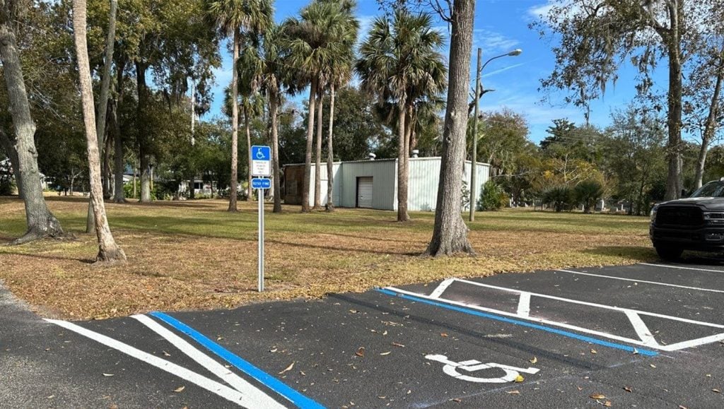 ada compliance parking spots freshly painted for Dignity Memorial Funeral Home parking lot