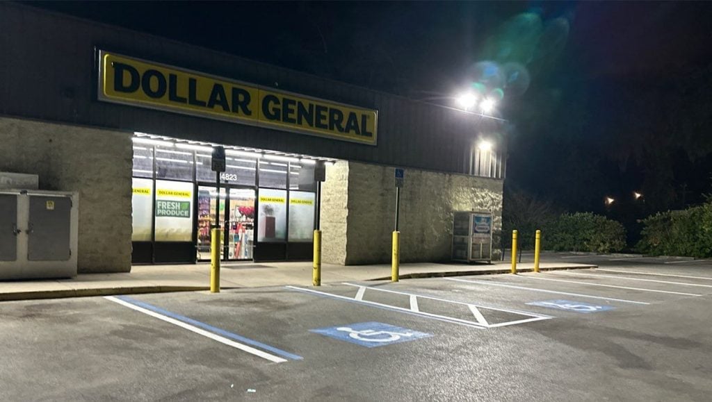 ada compliance parking spots freshly painted for Dollar General parking lot