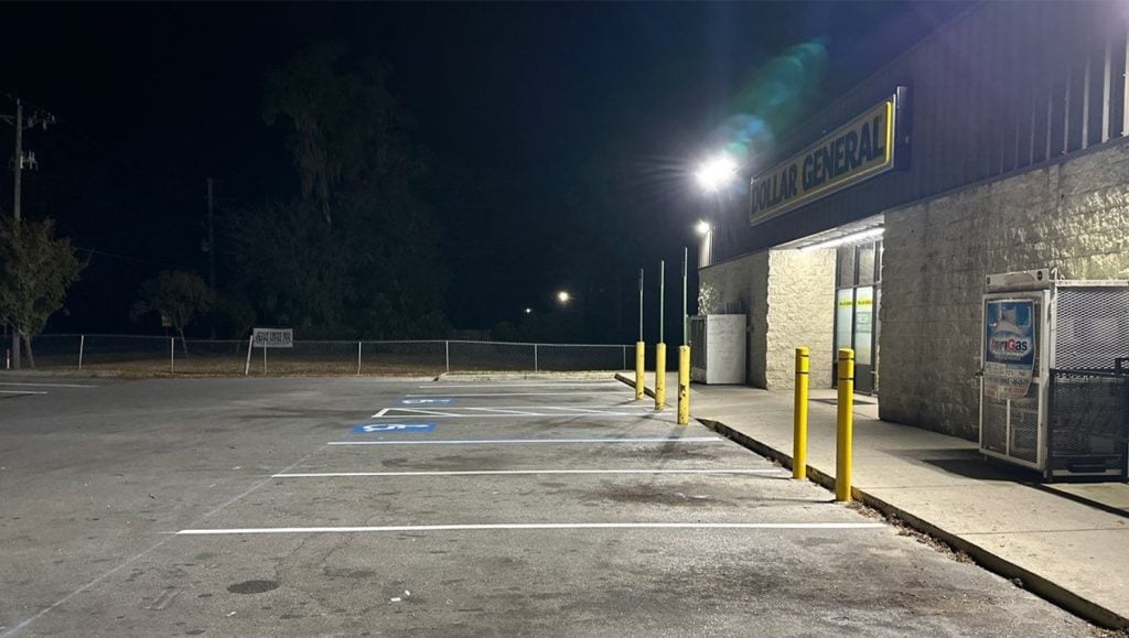 side view of Dollar General parking lot with freshly painted parking spots